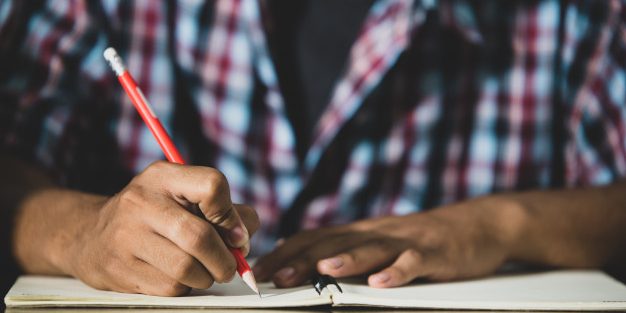 educational-theme-close-up-student-writing-classroom_1150-16615 (1)